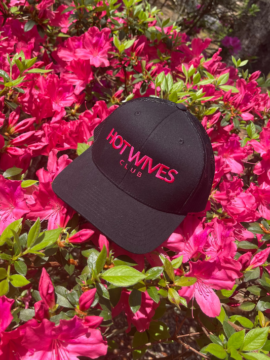 Black cap with 'HOT WIVES CLUB' text on a background of pink flowers